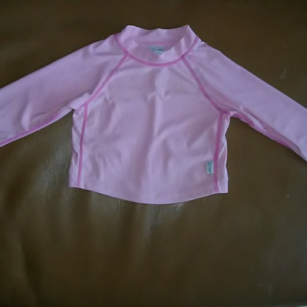 I play pink long sleeve rash guard